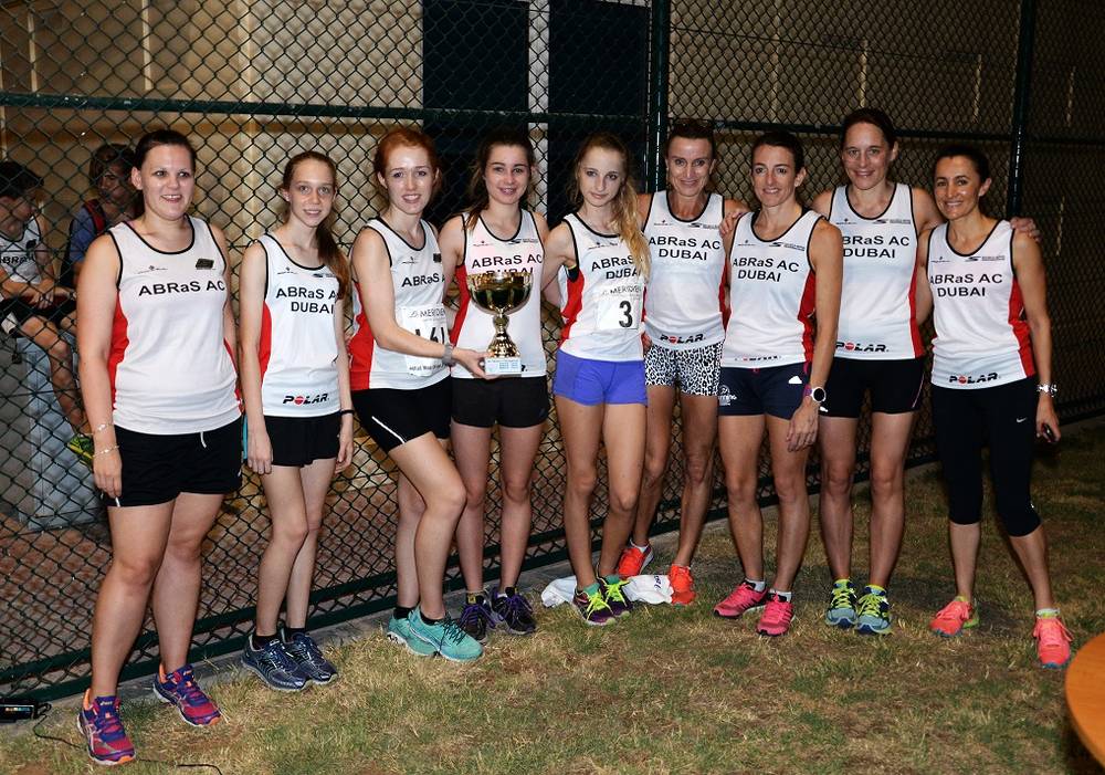 The women's team with a trophy