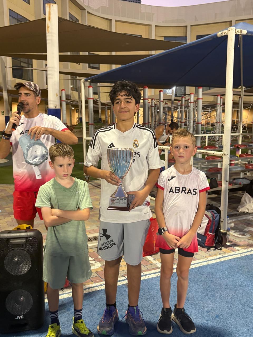 Junior boys with their trophy on awards night