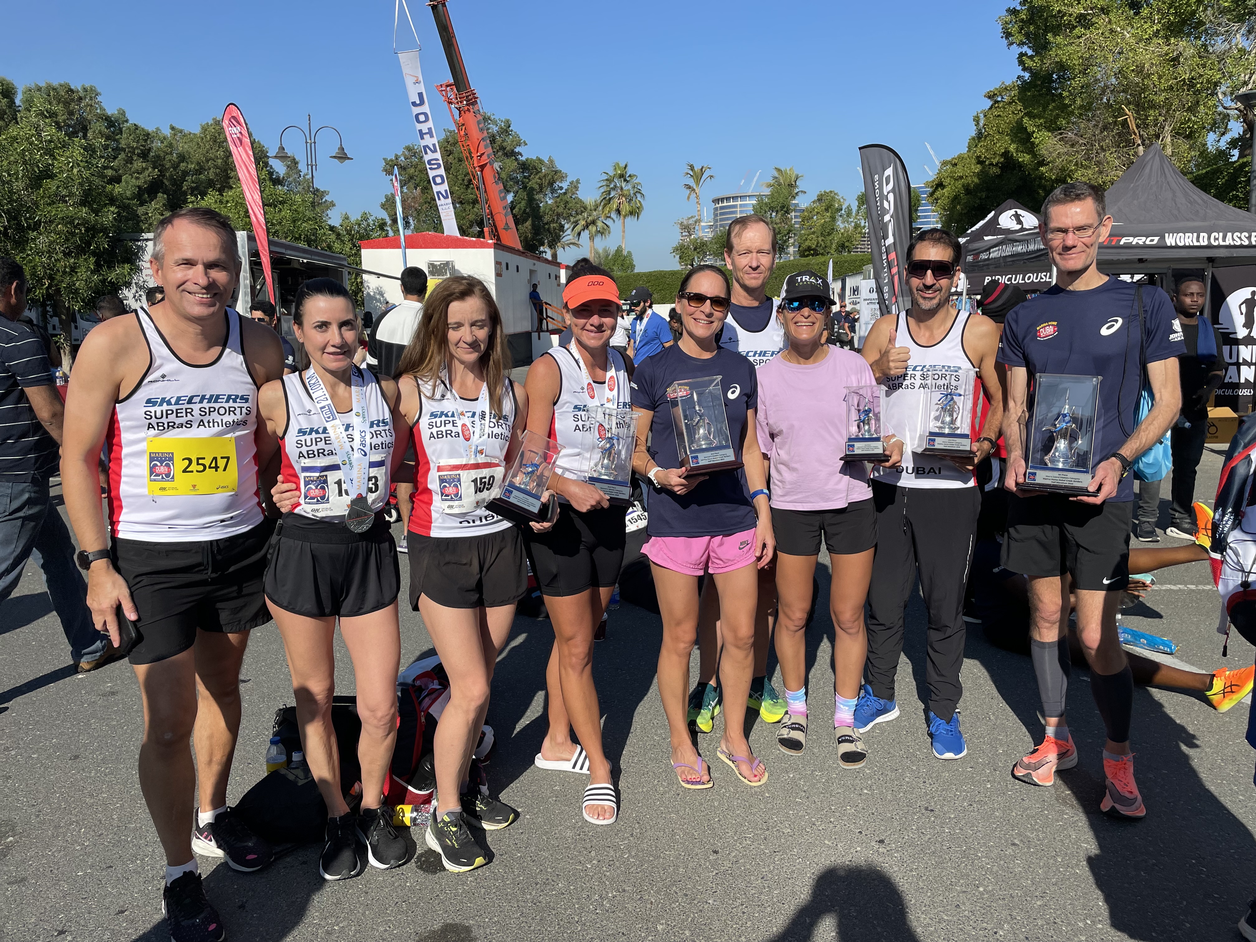 ABRaS squad with the Marina Home Dubai Half trophies